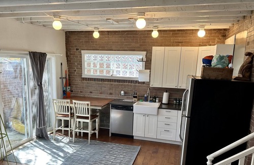 Jefferson Park Cottage | Unique Urban Carriage House with Ceder Hot Tub and Private Yard