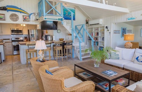 Dunmore Town House | Unique waterfront Harbour Island getaway! 2 house compound with private dock!