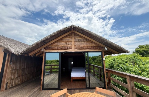 Elota Cabin | Unmatched Celestino Gazca - Cabin by the Coast