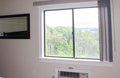 Weirs Beach Apartment | Unwind at The Village