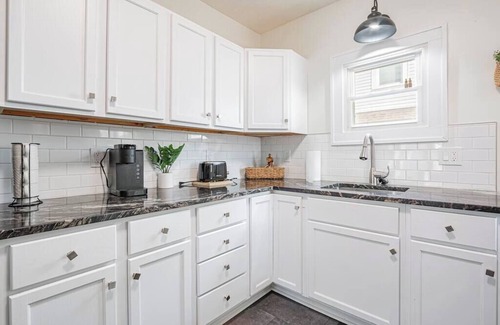 Firestone Park House | Unwind in a Hot Tub at a Retreat Haven