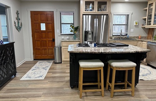Jay House | Updated 3 bedroom lakefront home offers privacy and comfort w dock on Grand Lake