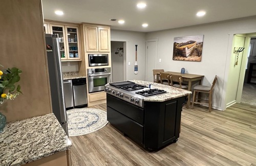Jay House | Updated 3 bedroom lakefront home offers privacy and comfort w dock on Grand Lake