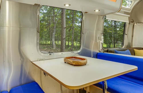 Menlo House | Updated Airstream tucked into trees with firepit, full bathroom & kitchenette
