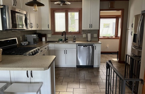 Sister Lakes House | Updated and fully appointed Round Lake waterfront home w/hot tub!