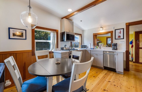 Old Town House | Updated, dog-friendly cottage with bay views, wraparound deck & EV charger