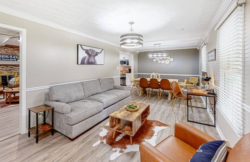 Lilburn House | Updated home with movie room, bar, entertainment space, Ping-Pong, & 2 kitchens