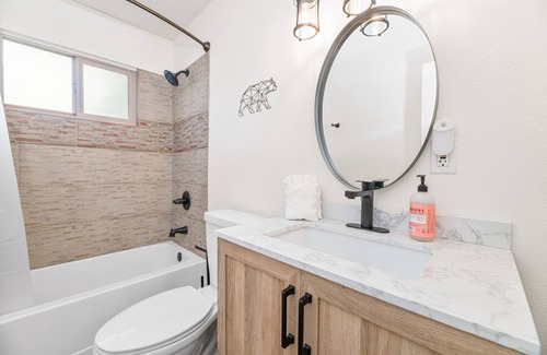 Peter Pan House | Updated single-level ranch with fenced yard, fire pit, spa, and outdoor dining!