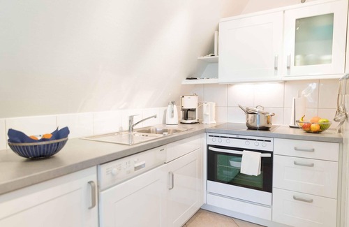 Norddorf Apartment | Upper floor apartment on 2 levels, up to 4 persons, with beach chair in the garden