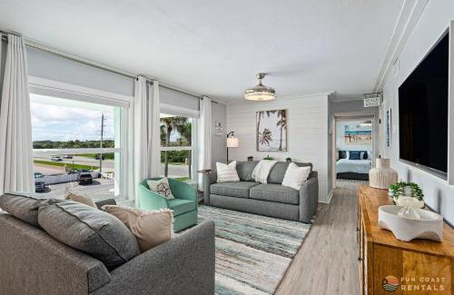 New Smyrna Beach Apartment | Upscale Dog Friendly and STEPS to the Beach! Spacious Modern Chic Condo!