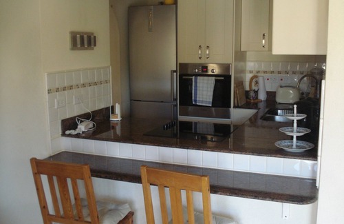 Rockley Apartment | Upscale furnished holiday apartment in quiet road with pool close to golf club