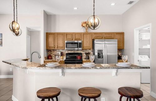 Buena Ventura Lakes House | Upstay - Waterside Home with Pool and Hot Tub