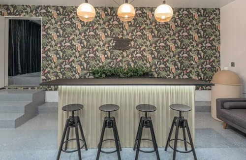 Logan Heights Apartment | Urban Jungle Garage House with Bar and Theatre