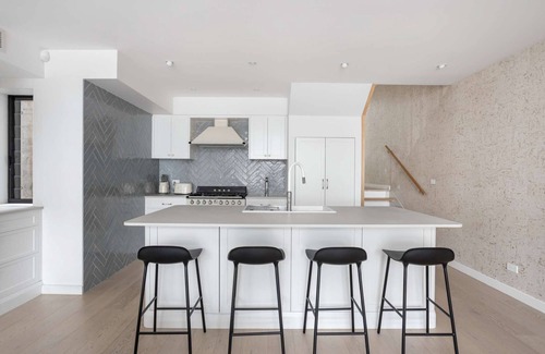 Newtown House | Urban oasis: Stylish 4BR retreat in vibrant Newtown