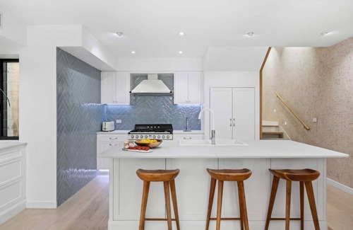 Newtown House | Urban oasis: Stylish 4BR retreat in vibrant Newtown