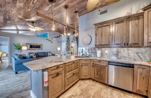 Matlacha Isles Villa | Fun'n Sun-Charming 3 BR/3 baths waterfront villa- pool, spa, dock, fishing poles