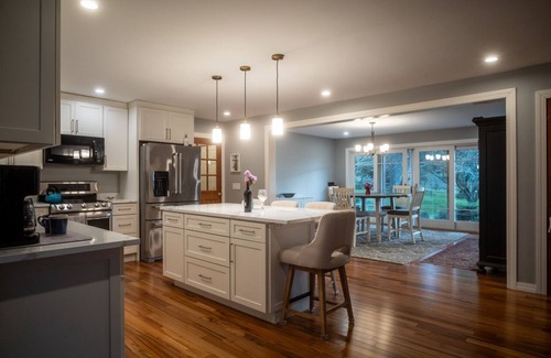 Waterbury House | Private hilltop home close to skiing. Enjoy views, hot tub & fire pit!