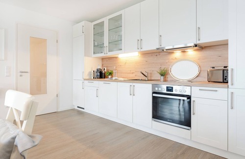 Bosau Apartment | Vacation apartment Maräne in Haus Seeblick with balcony and lake view in Bosau