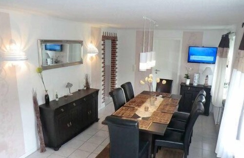 Groven House | Vacation home Am alten Deich - with sauna and garden for 8 people, dogs welcome