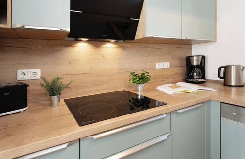 Sutel House | Vacation home Dat Strandhuus with 2 terraces in Sütel-Strand