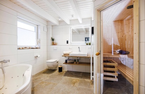 Nordhorn House | Vacation home with sauna, whirlpool, loft net, cooking island and gas fireplace