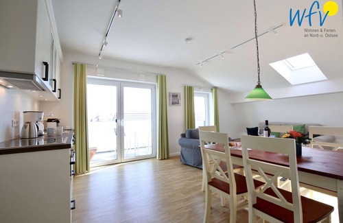 Wangerooge Apartment | Vacation with a sunny balcony and your own beach chair on the beach