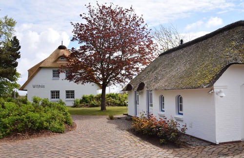Norddorf Apartment | Vacation with dog, incl. swimming pool and sauna, ground floor for 4 persons