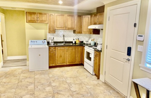 Oakridge House | Van east basement with 2 bed rooms with queen size bed