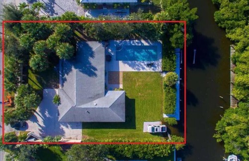 Vero Beach House | Vero Beach Island private gated scantuary with pool, 60' boat dock & kayak launch!