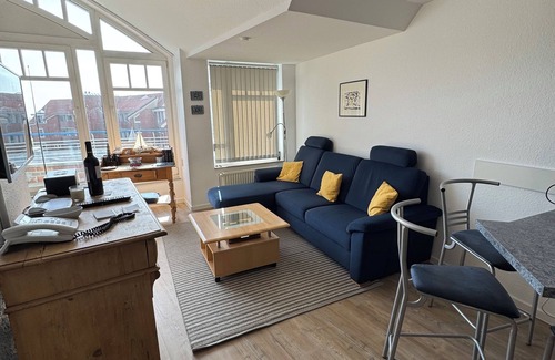 Dorumer Neufeld Apartment | Very cozy comfort vacation apartment with a pool, sauna and sea view