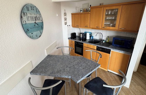 Dorumer Neufeld Apartment | Very cozy comfort vacation apartment with a pool, sauna and sea view