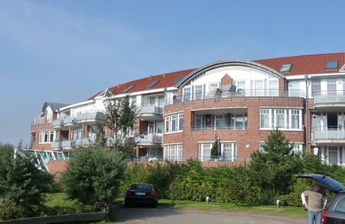 Dorumer Neufeld Apartment | Very cozy comfort vacation apartment with a pool, sauna and sea view
