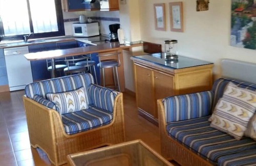 Costa Meloneras House | Very spacious bungalow with terrace, sea views, community pool and jacuzzi.