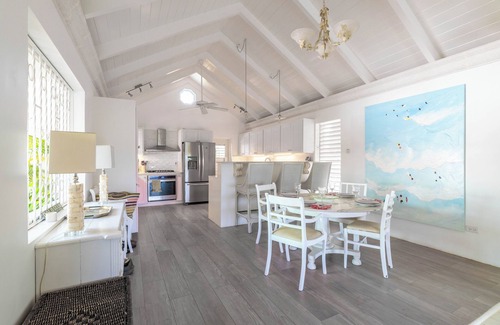 Holder's Hill House | Vibrant 4-Bedroom Villa with Pool & Polo Views, Steps from Paynes Bay Beach.