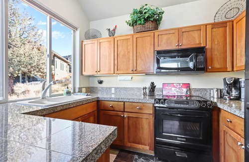 Redmond House | Vibrant home with fireplace, large balcony & access to indoor/outdoor pools