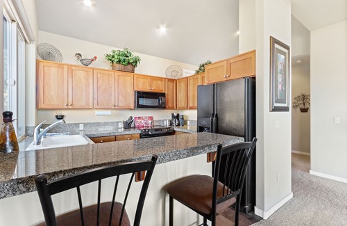 Redmond House | Vibrant home with fireplace, large balcony & access to indoor/outdoor pools