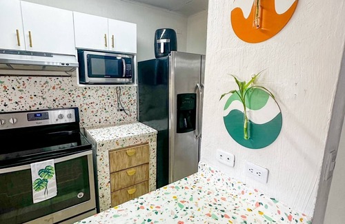 Escazu Apartment | Vibrant Jungle Oasis Apt- Long stays & Medical Tourism, Patio, Fitness Equipment