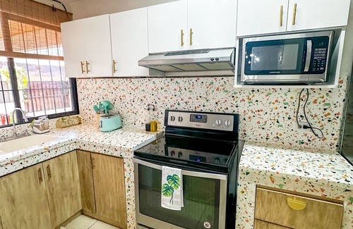 Escazu Apartment | Vibrant Jungle Oasis Apt- Long stays & Medical Tourism, Patio, Fitness Equipment