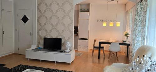 Oulainen Apartment | Viihtyisä kaksio ydinkeskustassa maantasossa