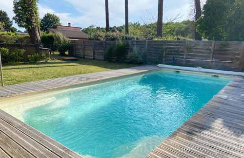 Mimizan Villa | Villa 4* Les Cahuttes with swimming pool between ocean and forest.