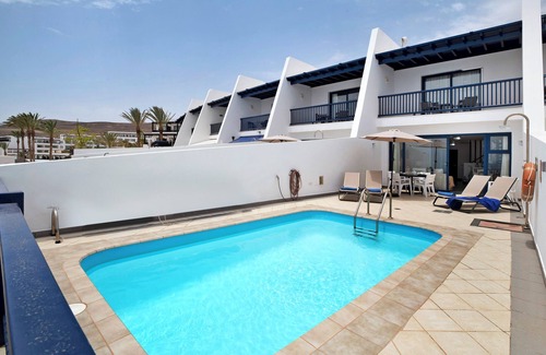 Puerto Calero Villa | Villa 'Ajaches 23' with Sea View, Heated Pool, Balcony, A/C & Wi-Fi