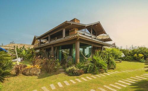 Barra de Ibiraquera House | Villa Bali Casas pé na areia