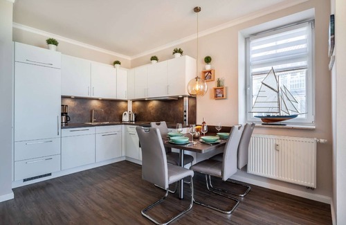 Moenchgut Peninsula Apartment | Villa Bergfrieden - fantastic sea view from the balcony, use of swimming pool and sauna