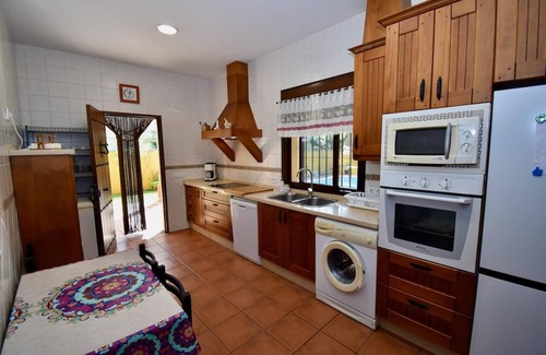 Chiclana de la Frontera Villa | Villa with wonderful garden, big BBQ area and pool