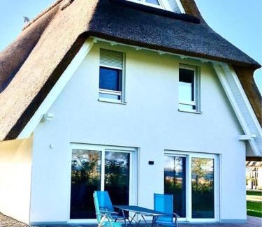 Am Salzhaff House | Villa Haffblick - Ferienhaus mit Kamin, Sauna und Meerblick