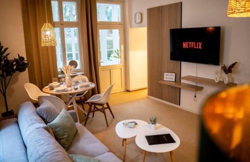 Bad Salzuflen Apartment | VILLA I 100m Kurpark I Wintergarten Boxspringbett I NETFLIX