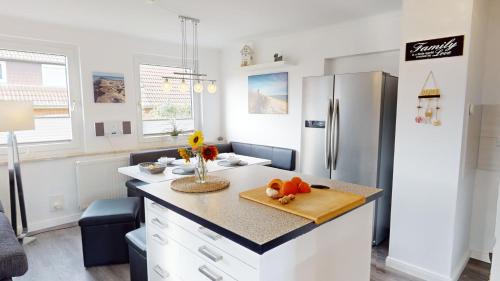 Groemitz Apartment | Villa Klarsinni Ferienwohnung 2 Strandkorb