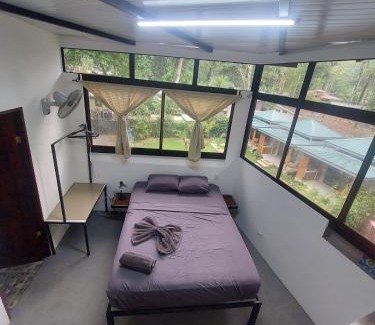 Chiguata Apartment | Villa Los Altos - Private Tree Suite Roof Top walk to Playa Chiquita