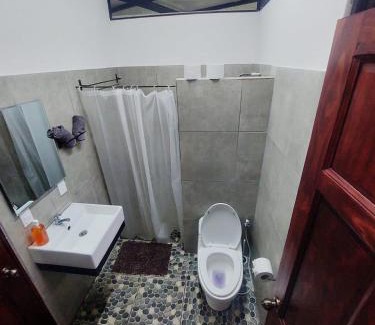 Chiguata Apartment | Villa Los Altos - Private Tree Suite Roof Top walk to Playa Chiquita