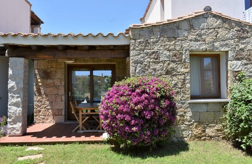 Lotzorai Apartment | Villa Menhir. Mediterranean garden. Mountain view.